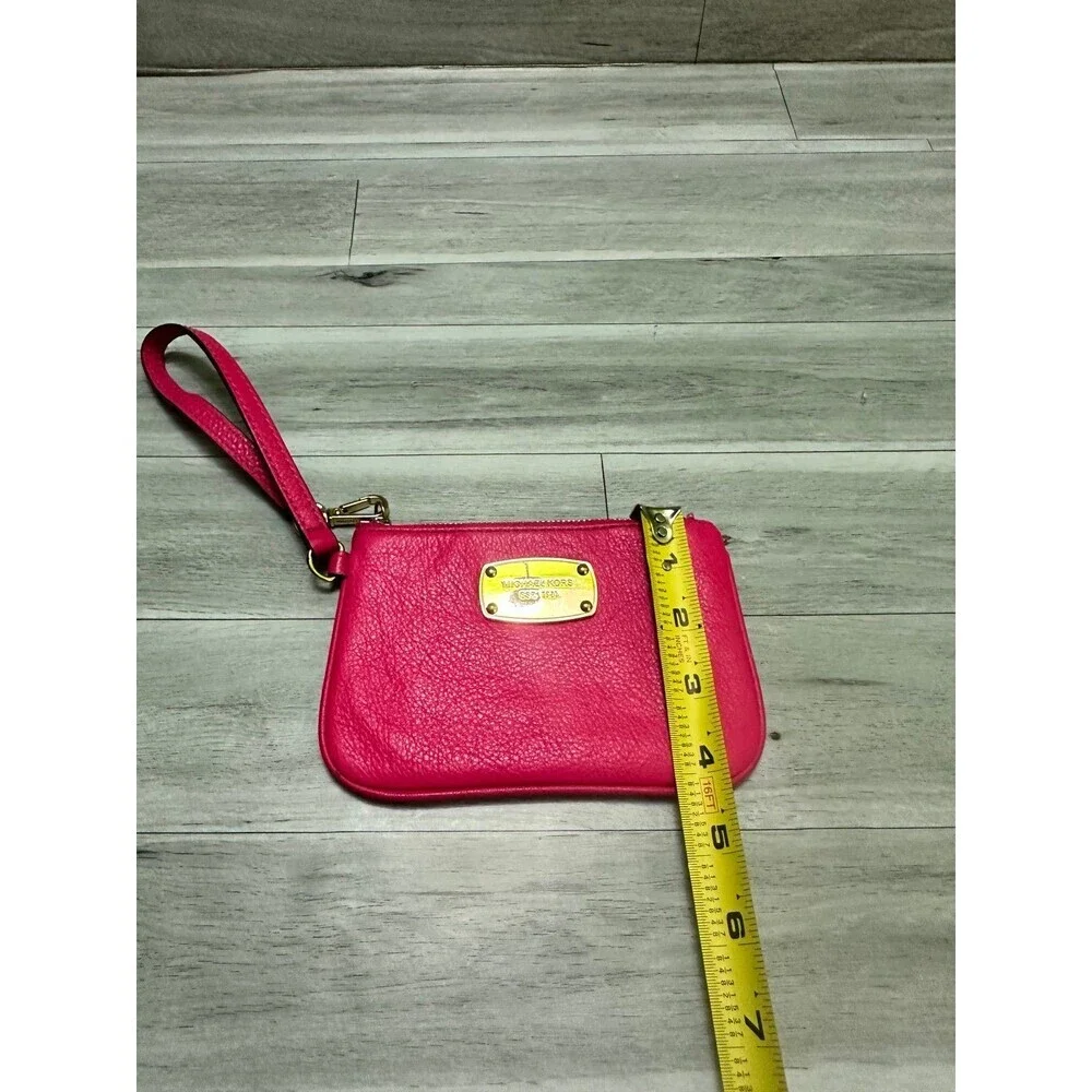 Michael Kors Fuchsia Leather Wristlet with Gold Plaque